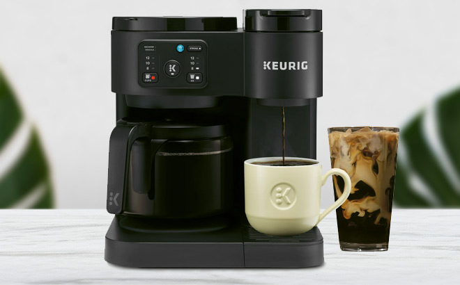 Keurig K Duo Essentials Hot Iced Single Serve K Cup Pod Coffee Maker Carafe on the Table