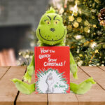 Kohls Cares How The Grinch Stole Christmas Plush and Book Bundle on a Table