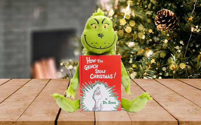 Kohls Cares How The Grinch Stole Christmas Plush and Book Bundle on a Table