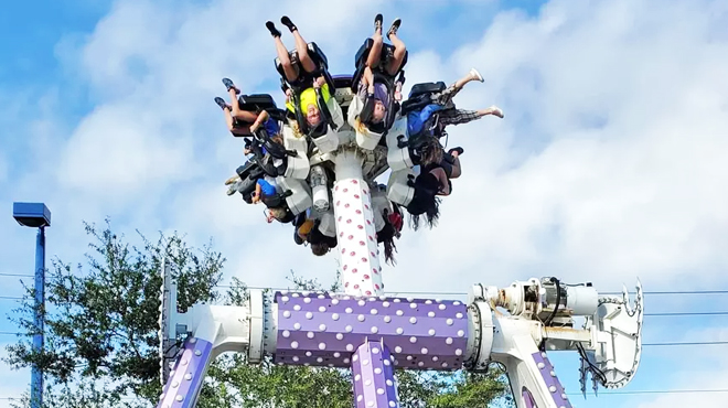 People Riding One of Andretti Thrill Parks Rides