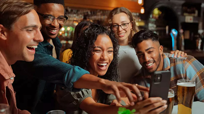 People Taking Pics While Dining at TGIF