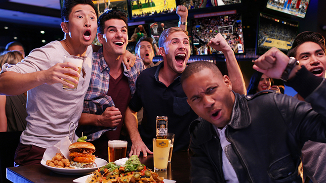 People cheering at Dave Busters Watch Party