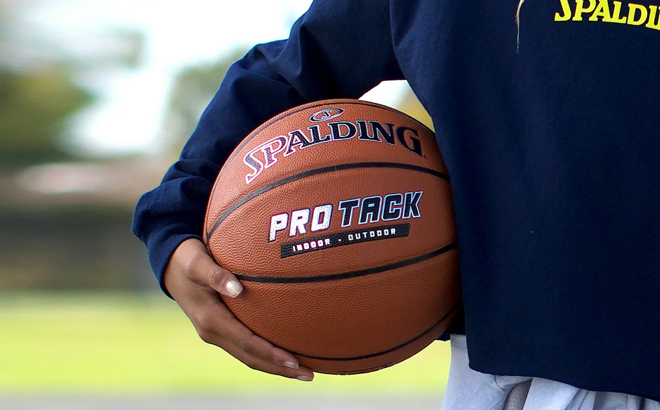 Person Holding Spalding Basketball