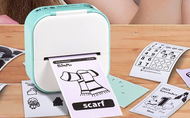 Portable Thermal Inkless Pocket Printer on a Table