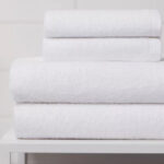 Room Essentials 4 Piece Antimicrobial Towel Set on a Table