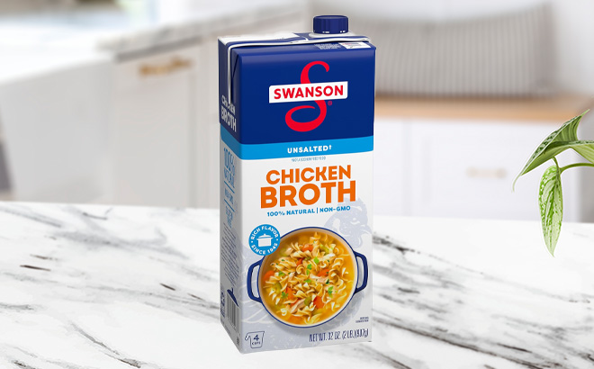 Swanson 100 Natural Unsalted Chicken Broth 32 oz Carton on the Kitchen Counter