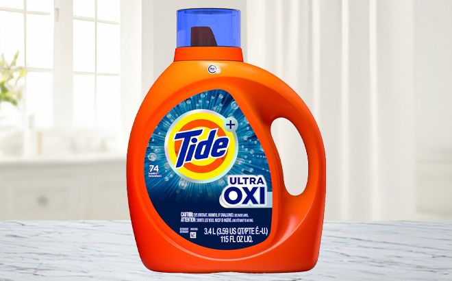 Tide Ultra Oxi Liquid Laundry Detergent 115 Ounce Bottle on a Table