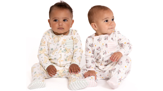 Two Infants wearing Disney Baby Wishes Dreams Baby Footed Sleep N Play Bodysuits