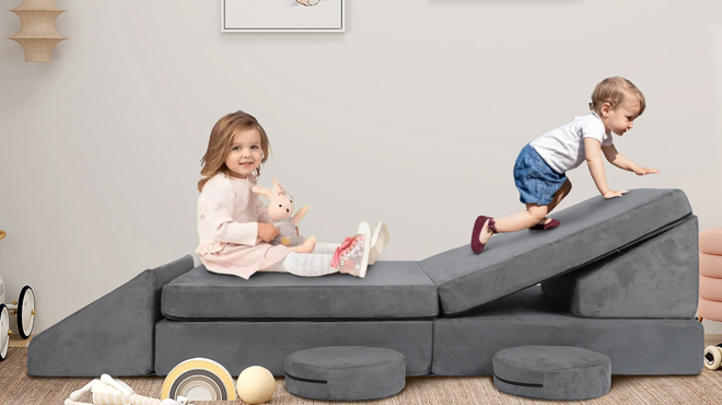 Two kids playing on a Aileekiss 9 pc Kids Sofa Couch Playset