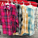 Universal Thread Womens Oversized Flannel Shirt Hanging on a Cart