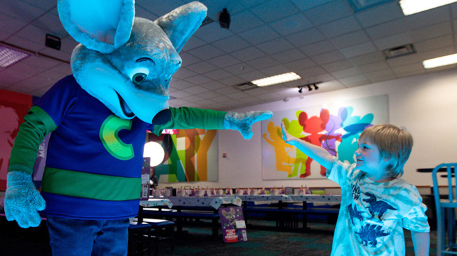 A Child Playing with Chuck E