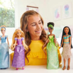 A Child Playing with Disney Princess Dolls