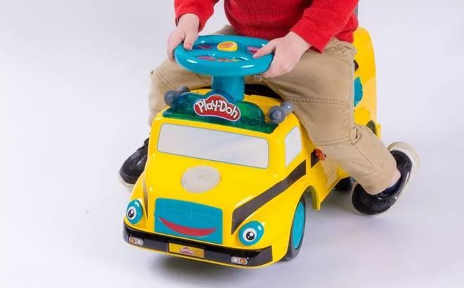 A Child Riding the Flybar Play Doh Educational Toys Kids Toddler Ride On Push Cars School Bus