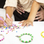 A Family Making Beads Bracelet