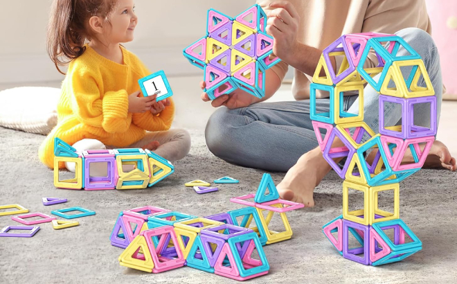 A Father and Daughter Playing with Rurvale Magnetic Tiles