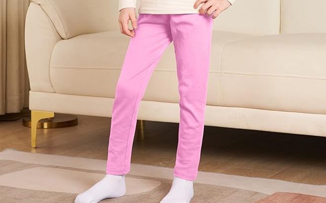 A Girl Wearing thick Cotton Leggings in Pink