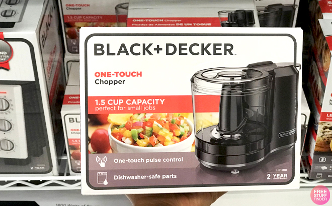 A Hand holding a Black Decker 1 5 Cup One Touch Chopper