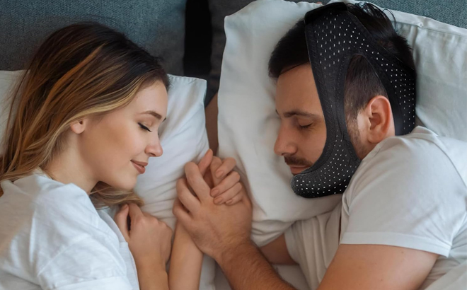 A Man Wearing Anti Snoring Chin Strap