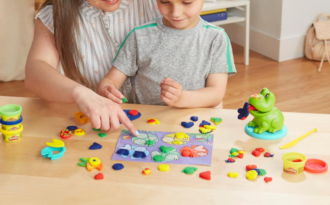 A Mother and Child Playing with Play Doh Frog n Colors Starter Set