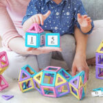 A Mother and Kid Playing with Rurvale Magnetic Tiles