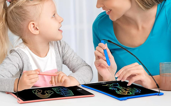 A Mother and a Child Using Kids Writing tablets