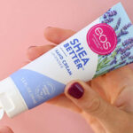 A Person Applying Eos Shea Butter Hand Cream