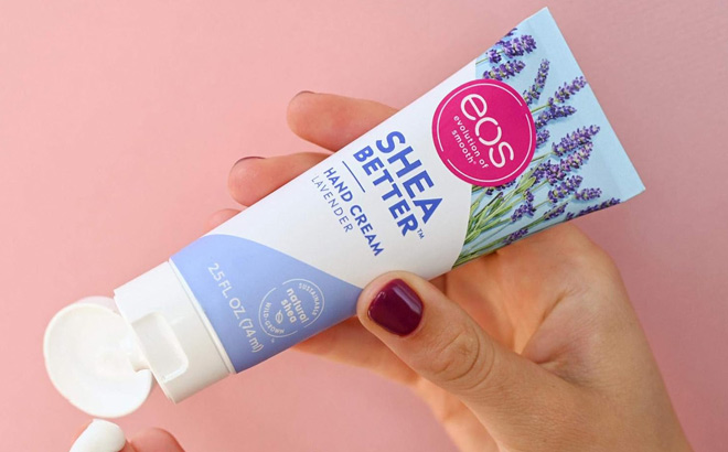 A Person Applying Eos Shea Butter Hand Cream