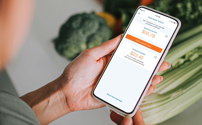 A Person Checking Rewards Earnd on Walmart MoneyCard App