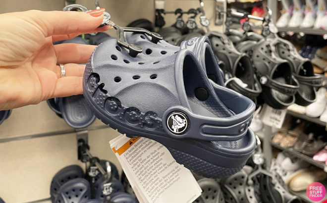 A Person Holding Crocs Toddler Baya Clogs