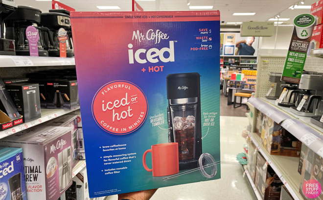 A Person Holding Mr Coffee Iced Hot Single Serve Coffeemaker