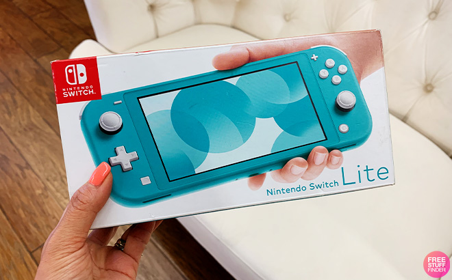 A Person Holding Nintendo Switch Lite