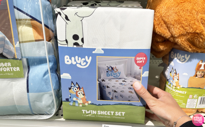 A Person Holding a Bluey Twin Kids Sheet Set