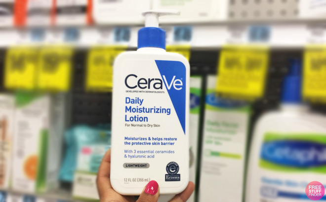 A Person Holding a Bottle of CeraVe Lotion