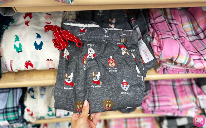 A Person Holding a Christmas Pajama