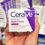 A Person Holding a Jar of Cerave Night Cream