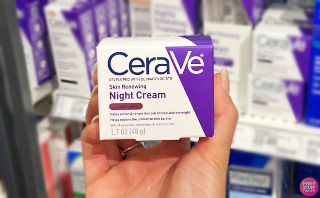 A Person Holding a Jar of Cerave Night Cream