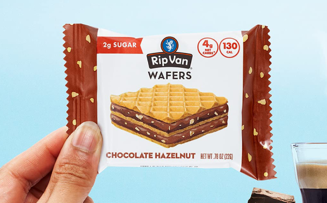 A Person Holding a Rip Van Chocolate Hazelnut Wafer Cookie