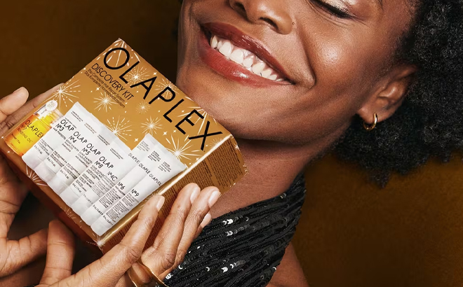 A Person Holding the Olaplex Holiday Discovery Kit