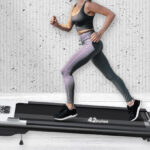 A Person Running on the Wellfit Walking Pad Treadmill