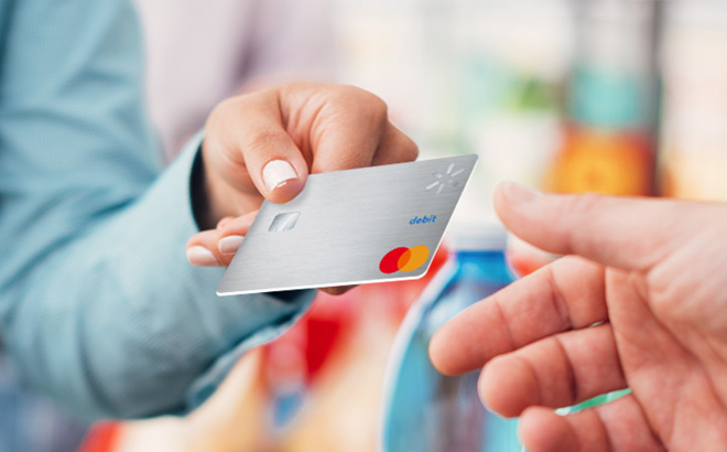 A Person Using Walmart MoneyCard