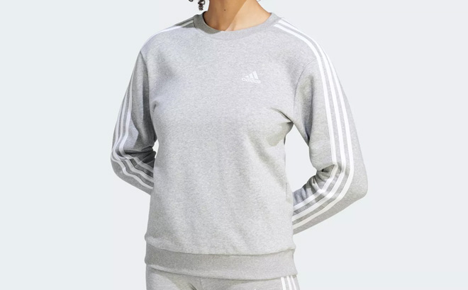 A Person Wearing Adidas Sweatshirt