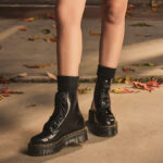 A Person Wearing Dr Martens Womens Molly Platform Boots