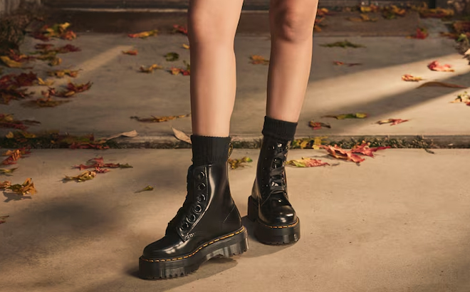 A Person Wearing Dr Martens Womens Molly Platform Boots