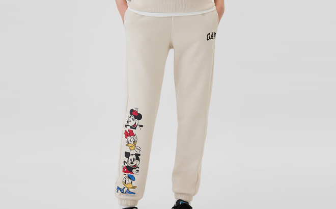 A Person Wearing GAP Factory Disney Joggers