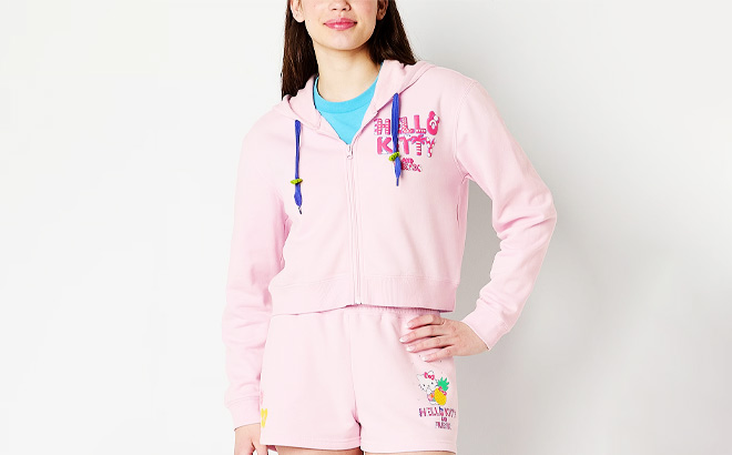 A Person Wearing Juniors Womens Long Sleeve Hello Kitty Zipper Hoodie