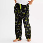 A Person Wearing Licensed Character Mens Dr Seuss How the Grinch Stole Christmas Super Minky Pajama Pants