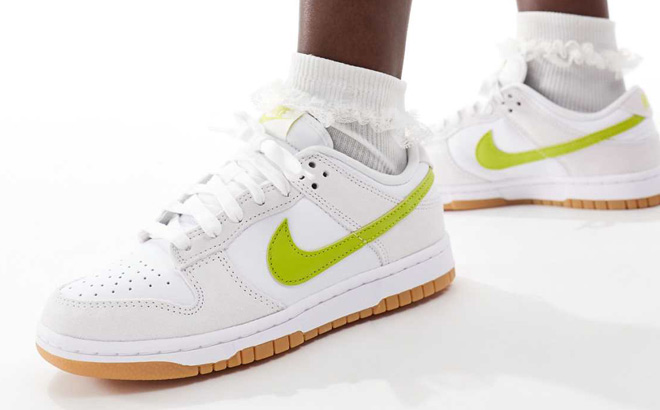 A Person Wearing Nike Dunk Low Shoes