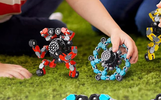 A Person playing with Transformable Fidget Spinner