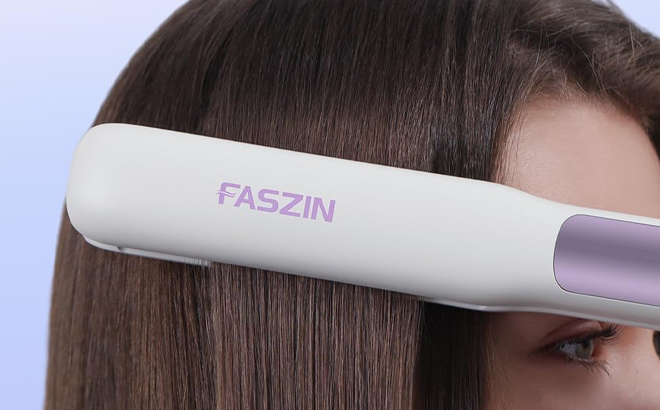 A Person using Faszin 2 in 1 Hair Straightener and Curler on their Hair