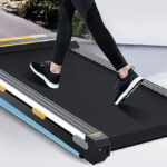 A Person walking on a Akluer Under Desk Walking Pad Treadmill